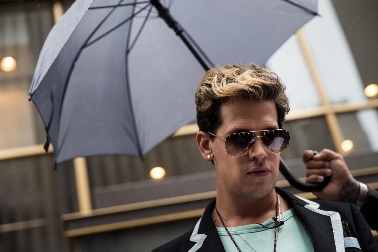 Milo Yiannopoulos pauses while speaking outside the offices of Simon & Schuster publishing company: Drew Angerer/Getty Images