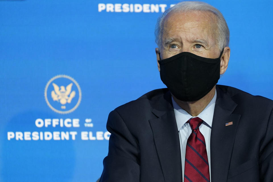 President-elect Joe Biden listens during an event at The Queen theater in Wilmington, Del., Tuesday, Dec. 8, 2020, to announce his health care team. (AP Photo/Susan Walsh)