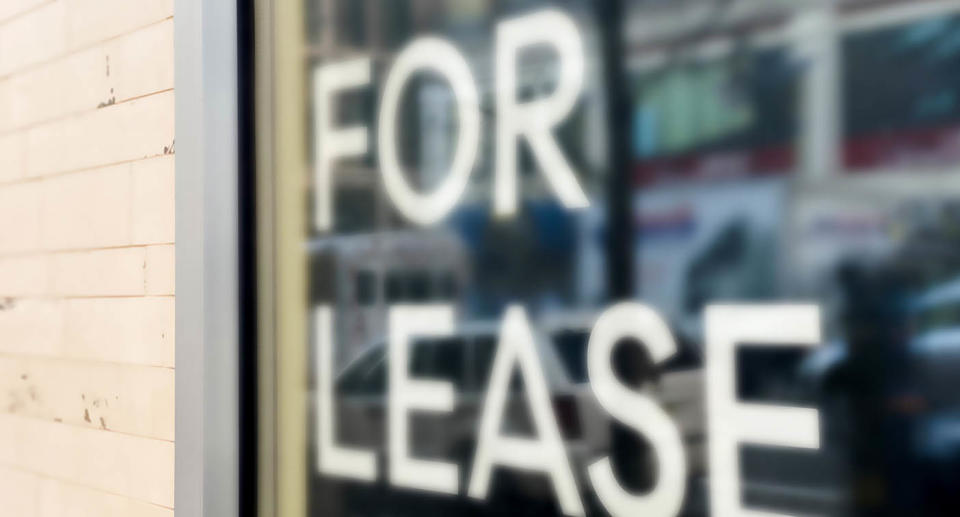 A 'for lease' sign on the window.