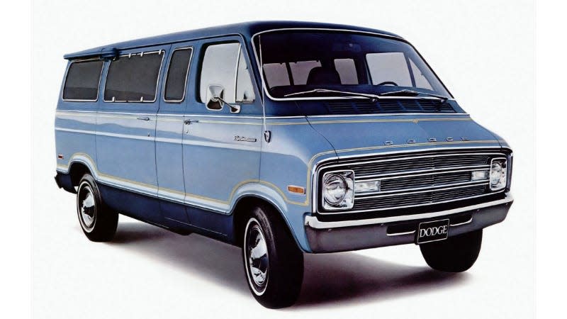 A photo of a blue Dodge B300 van.