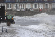 In Swanage, Dorset, temporary flood defences were put in place. (PA)