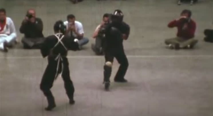 Bruce Lee (left) spars with one of his student at the 1967 Long Beach International Karate Championships.