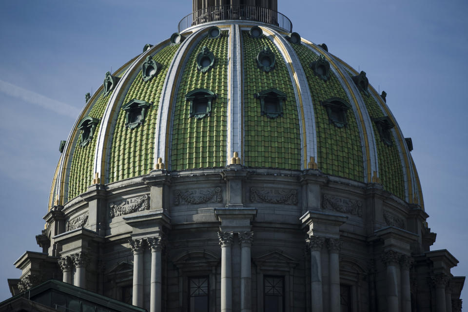 FILE - In this Feb. 5, 2019, file photo, the dome caps the Pennsylvania Capitol in Harrisburg, Pa. It takes hundreds of millions of dollars a year for the Pennsylvania General Assembly to maintain what is one of the country's largest legislative staffs, a small army with a voracious appetite for food, shelter, transportation, office supplies and computer equipment. (AP Photo/Matt Rourke, File)