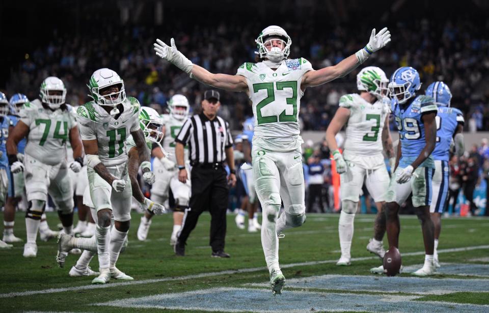 Oregon Ducks wide receiver Chase Cota (23) celebrates after scoring a touchdown against the North Carolina Tar Heels during the second half of the 2022 Holiday Bowl at Petco Park.