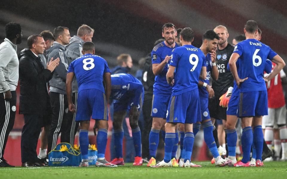 Brendan Rodgers, manager of Leicester City, gives his team instructions during a drinks break  - GETTY IMAGES