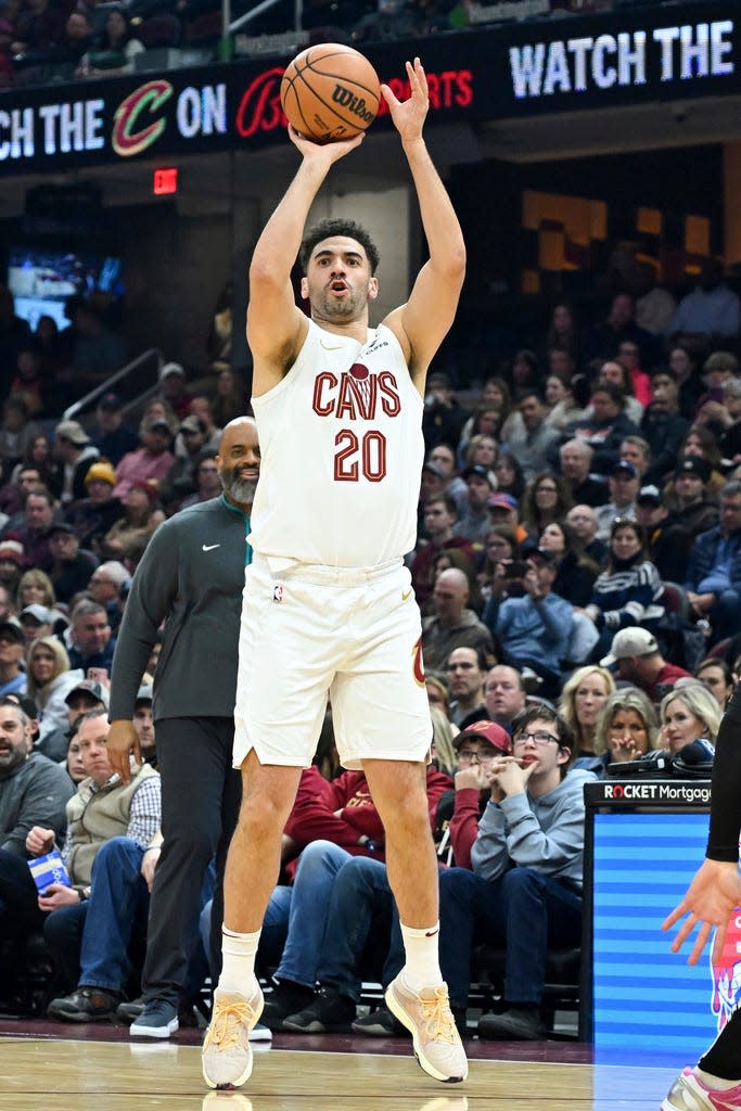 Cavaliers forward Georges Niang shoots a first-half 3-pointer against the Washington Wizards, Friday, Jan. 5, 2024, in Cleveland.