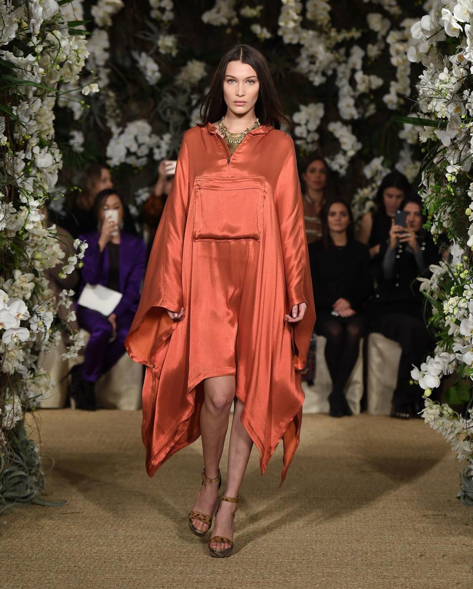 <p>Bella Hadid walked Ralph Lauren's AW17 NYFW show in a burnt orange parachute dress</p>