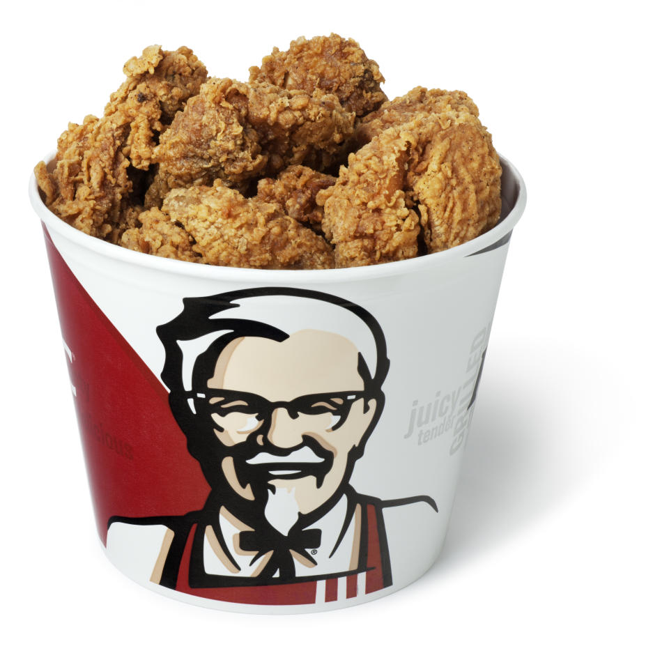 San Diego, California, United States - April 13th 2011: This is a photo of a bucket of Kentucky Fried Chicken on a white background. The original recipe for KFC is a trade secret and there is only one handwritten copy kept in a vault at corporate headquarters.