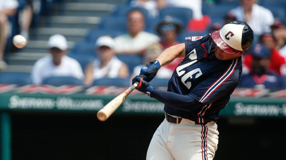 Cleveland Guardians' Will Brennan (17) hits a home run during the eighth inning against the Seattle Mariners on Thursday in Cleveland.