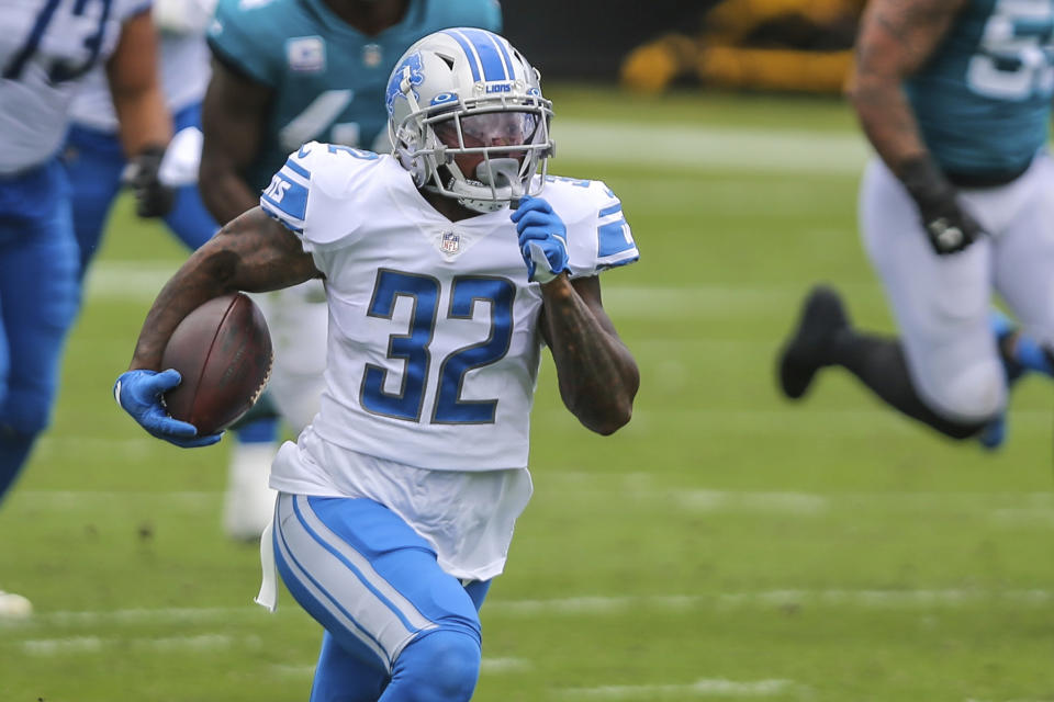 Running back D'Andre Swift (32) is one of the Lions' interesting young players. (AP Photo/Gary McCullough, File)