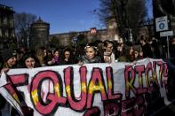 <p>Young women take part in the Women’s March against Violence as part of International Women’s Day on March 8, 2018, in Milan, Italy. (Photo: Marco Bertorello/AFP/Getty Images) </p>