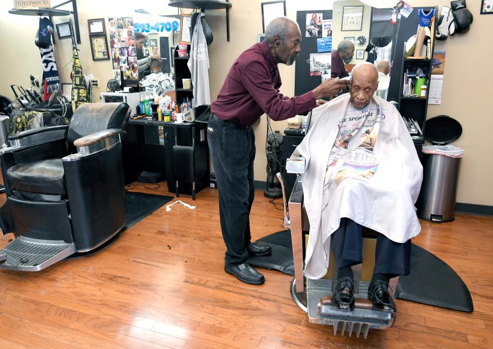 Vernon Winfrey cuts Leroy McMurray's hair at Winfrey’s barbershop in east Nashville on Jan. 11, 2018. Winfrey is the father of Oprah Winfrey.