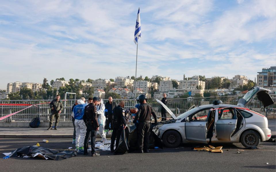 Shots were fired at civilians at a bus stop, police said