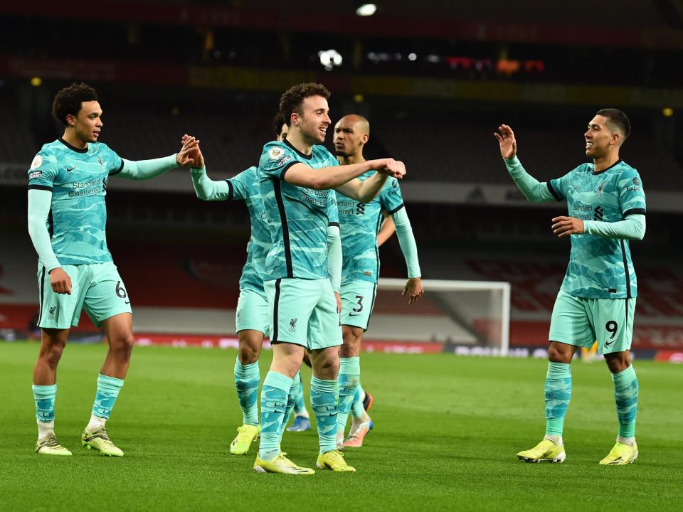 Diogo Jota celebrates with his Liverpool teammatesGetty