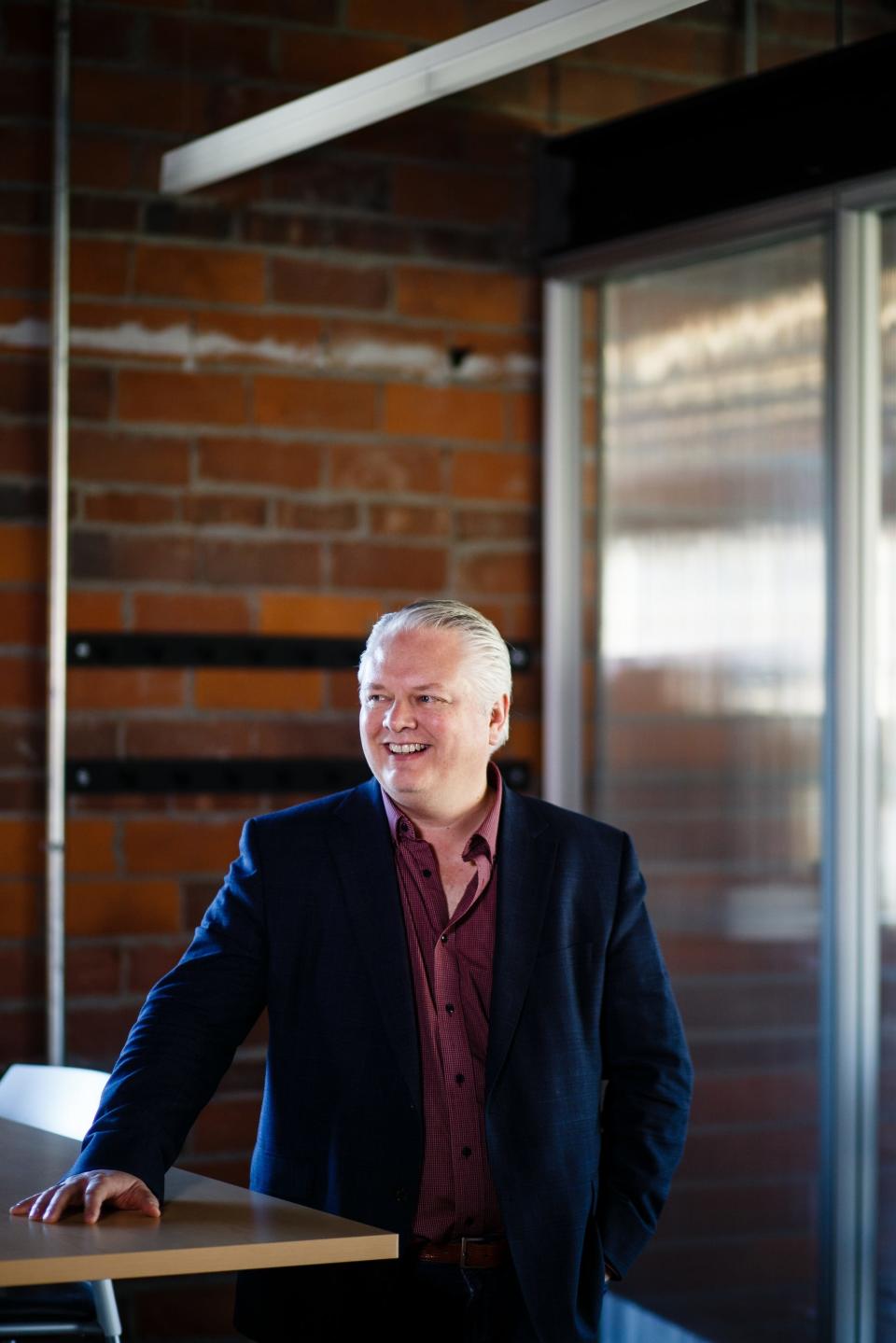 Growing up in Independence, Pillar Technology's Linc Kroeger has a passion for reviving rural communities. He is heading a program in Jefferson that will prepare high school students with the digital skills needed to obtain a job with the company. Here, Kroeger poses for a portrait at The Forge in Des Moines on Thursday, Oct. 4, 2018 in Des Moines. A Forge just like this one is being built in Jefferson.