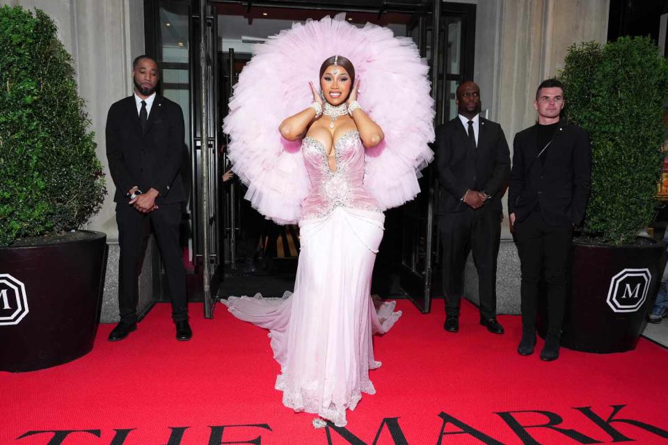 <p>Ilya S. Savenok/Getty Images for The Mark</p> Cardi B departs The Mark Hotel for the 2023 Met Gala