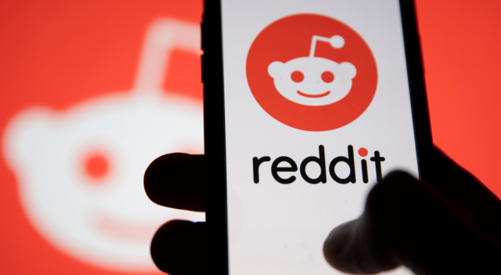 Reddit logo displayed on a smartphone device. RDDT stock