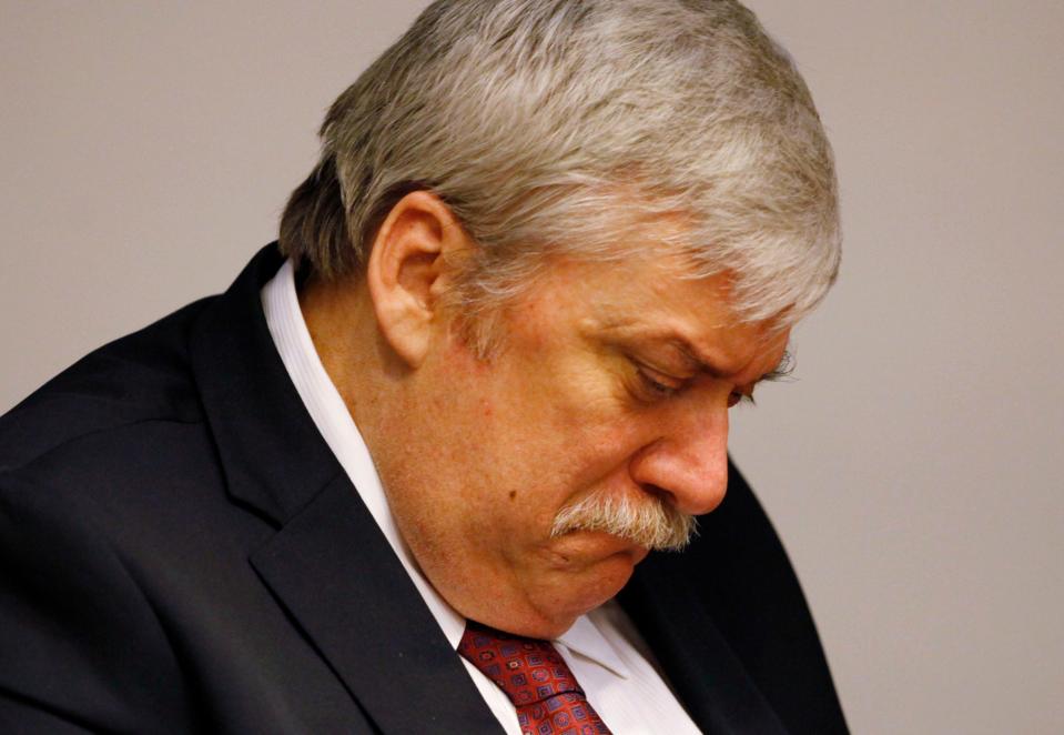 Douglas Stangeland, a Missouri man accused of kidnapping Newton business store owner Jeffrey Muller in January 2010, holds back tears as his son Derek takes the witness stand in his defense in state Superior Court in Sussex County on Tuesday, May 5, 2015, in Newton.