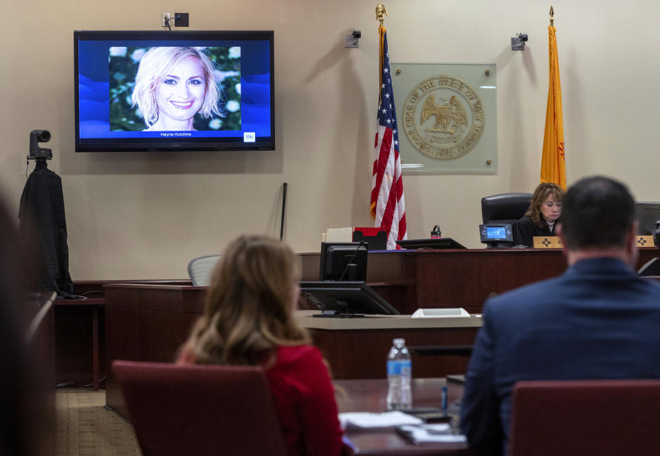 CORRECTS SOURCE TO ALBUQUERQUE JOURNAL INSTEAD OF SANTA FE NEW MEXICAN - A photo of cinematographer Halyna Hutchins is displayed during the trial against Hannah Gutierrez-Reed, in First District Court, in Santa Fe, N.M., Thursday, February 22, 2024. Gutierrez-Reed, who was working as the armorer on the movie "Rust" when a revolver that actor Alec Baldwin was holding fired killing Hutchins and wounded the film’s director Joel Souza, is charged with involuntary manslaughter and tampering with evidence. (Eddie Moore/The Albuquerque Journal via AP, Pool)