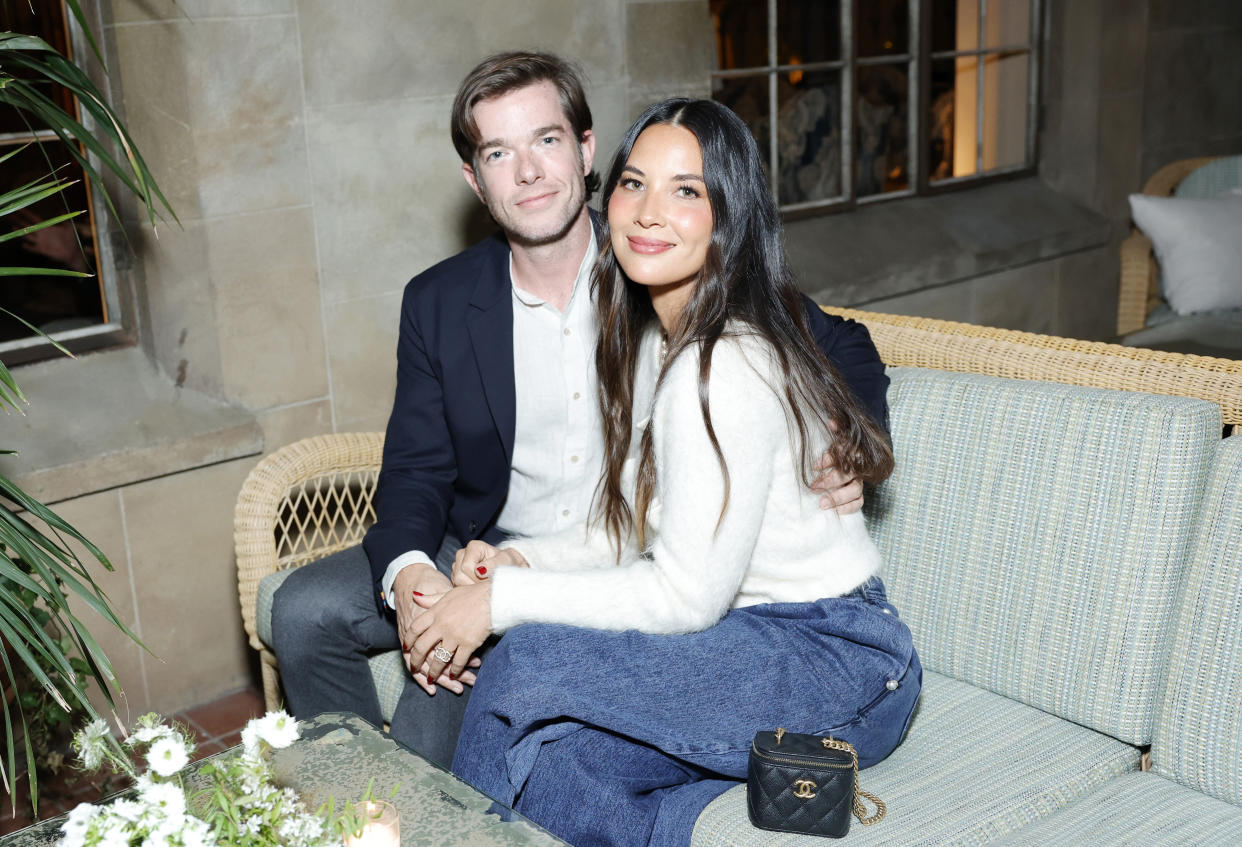 John Mulaney and Olivia Munn cuddle at the Chanel dinner to celebrate the launch of Sofia Coppola's book 