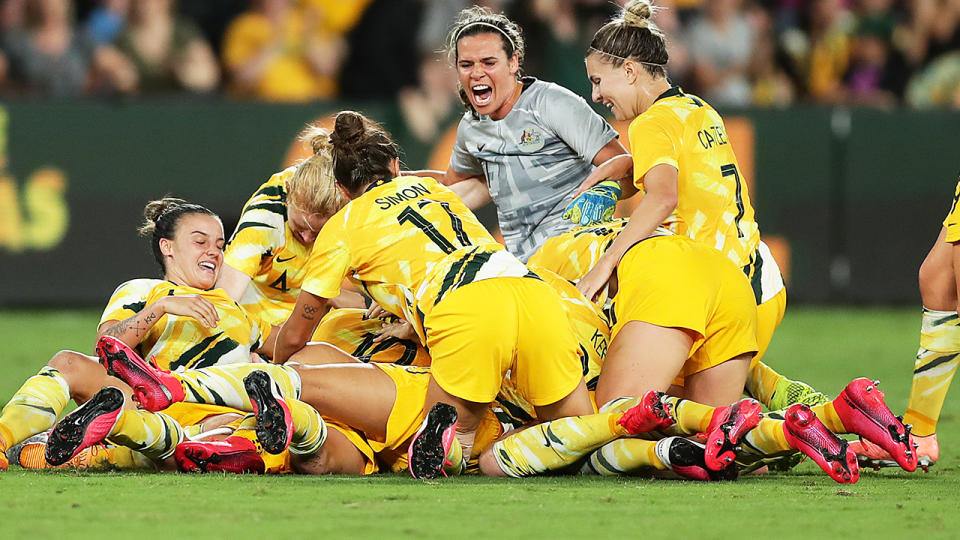 The Matildas, pictured here celebrating Emily van Egmond's late goal against China.