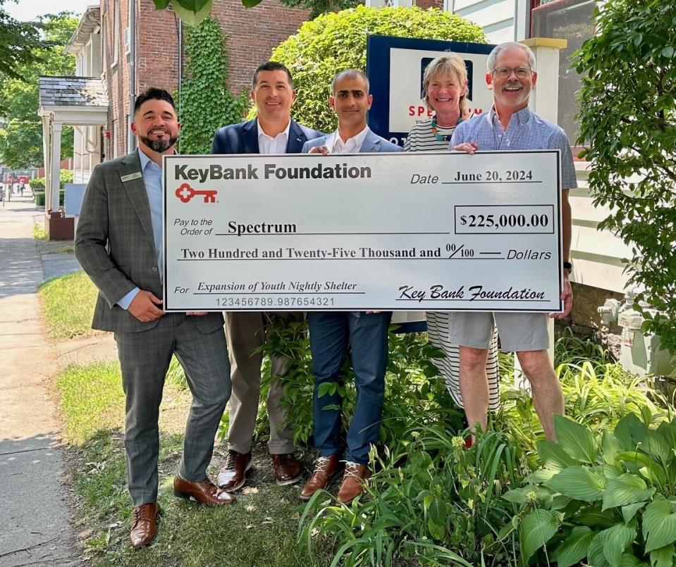 Pictured at a recent check presentation are (from left) KeyBank Market Retail Leader Nicholas Stevens, Market President Tony DiSotto, Area Retail Leader Gamal Alsalahi, Corporate Responsibility Officer Brigitte Ritchie, and Spectrum Executive Director Mark Redmond.