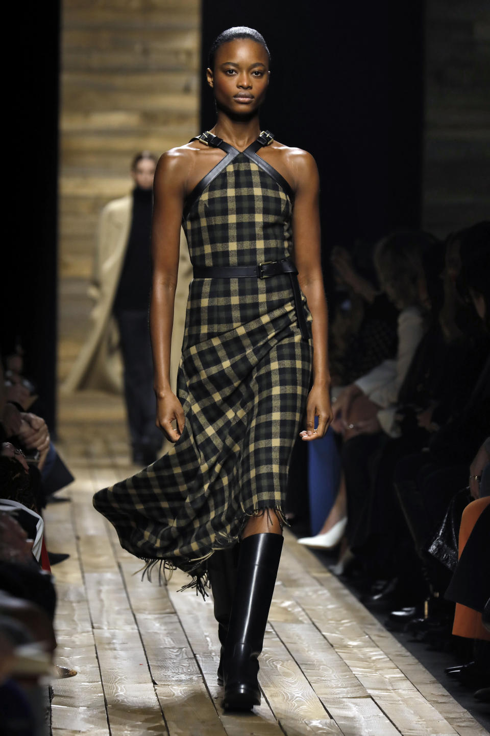 The Michael Kors collection is modeled during Fashion Week in New York, Wednesday, Feb. 12, 2020. (AP Photo/Richard Drew)