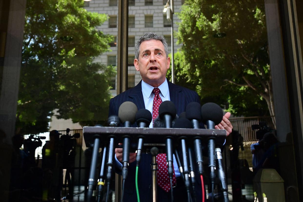 Mark Werksman, attorney for Harvey Weinstein, speaks to the press outside court on July 21, 2021, after Weinstein pleaded not guilty in Los Angeles.