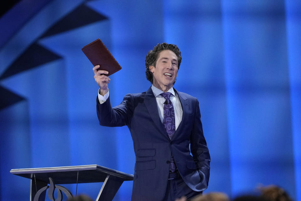 Pastor Joel Osteen preaches during a service Sunday, Feb. 18, 2024, in Houston. Pastor Osteen welcomed worshippers back to Lakewood Church for the first time since a woman with an AR-style opened fire in between services at his Texas megachurch last Sunday. (AP Photo/David J. Phillip)