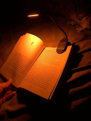 A rechargeable, clip-on amber book light if you love to read yourself to sleep but don't want to be kept up by bright white or blue lights