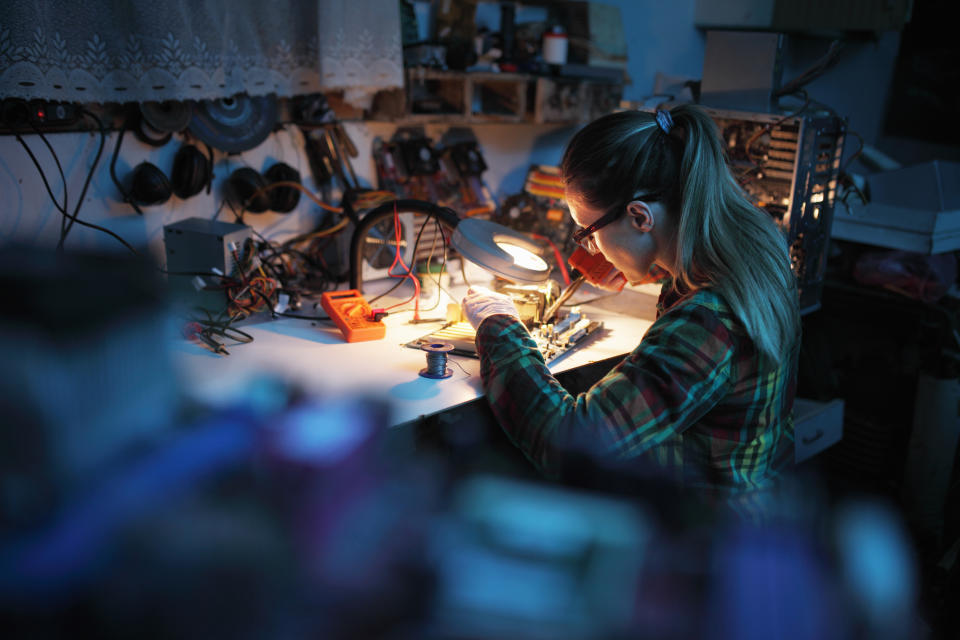 A woman is working in her office