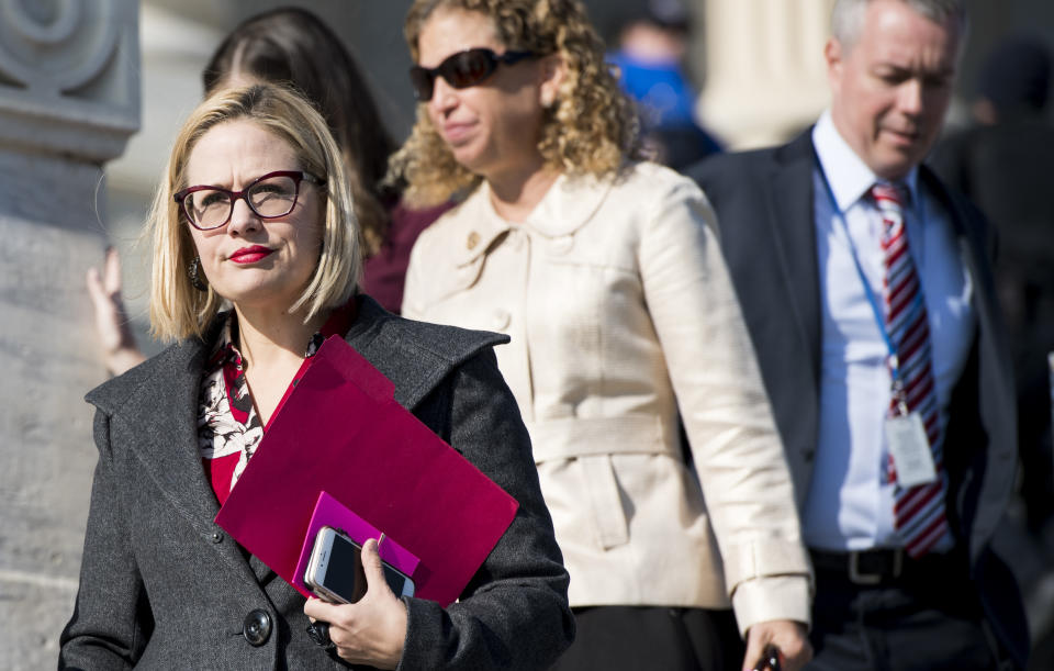 Rep. Kyrsten Sinema, D-Ariz., walks down the House steps following a vote in the Capitol on Dec. 1. (Photo: Bill Clark/CQ Roll Call via Getty Images)