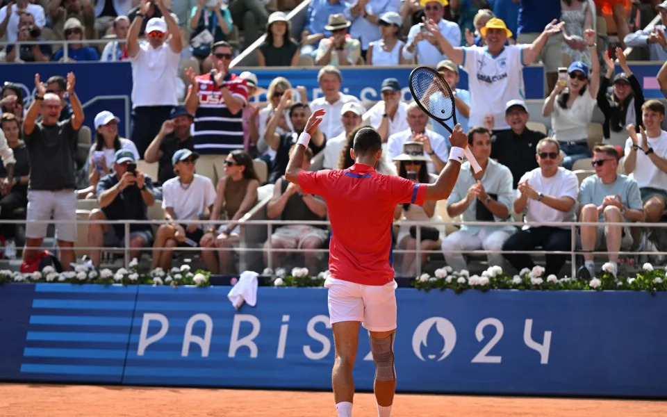 Djokovic celebrates winnning a point in the finals of the men's singles tennis at the Olympics