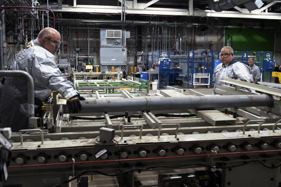 FILE - In this photo provided by the U.S. Army, workers at the Blue Grass Chemical Agent Destruction Pilot Plant in Richmond, Ky., begin the destruction of the first rocket from a stockpile of M55 rockets with GB nerve agent, July 6, 2022. (U.S. Army via AP, File)