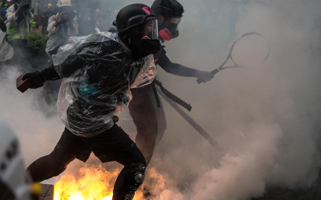 Protesters clash with police after an anti-government rally in Hong Kong's Tsuen Wan district  - Getty Images AsiaPac