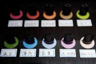 Pods of different flavors are seen on display at an authorized reseller store of Chinese e-cigarette company Relx in Shanghai