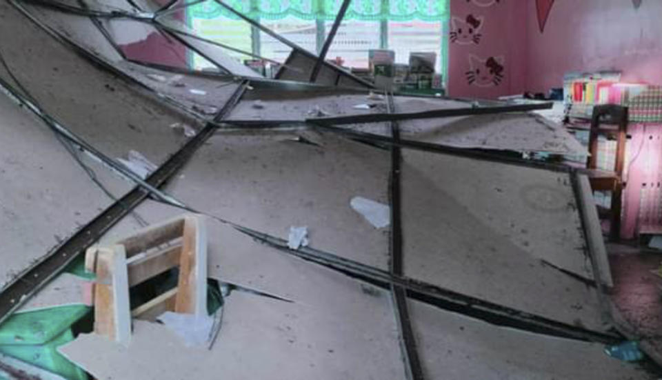 In this handout photo provided by the Philippine Red Cross, the ceiling of a damaged classroom in Alberto Olarte Sr. National High School in Sarangani, Davao Occidental province, southern Philippines on Friday Nov. 17, 2023. A powerful undersea earthquake has shaken the southern Philippines. The U.S. Geological Survey says the quake measured magnitude 6.7 and was located 26 kilometers (16 miles) from Burias at the southern tip of the Philippines. (Philippine Red Cross via AP)