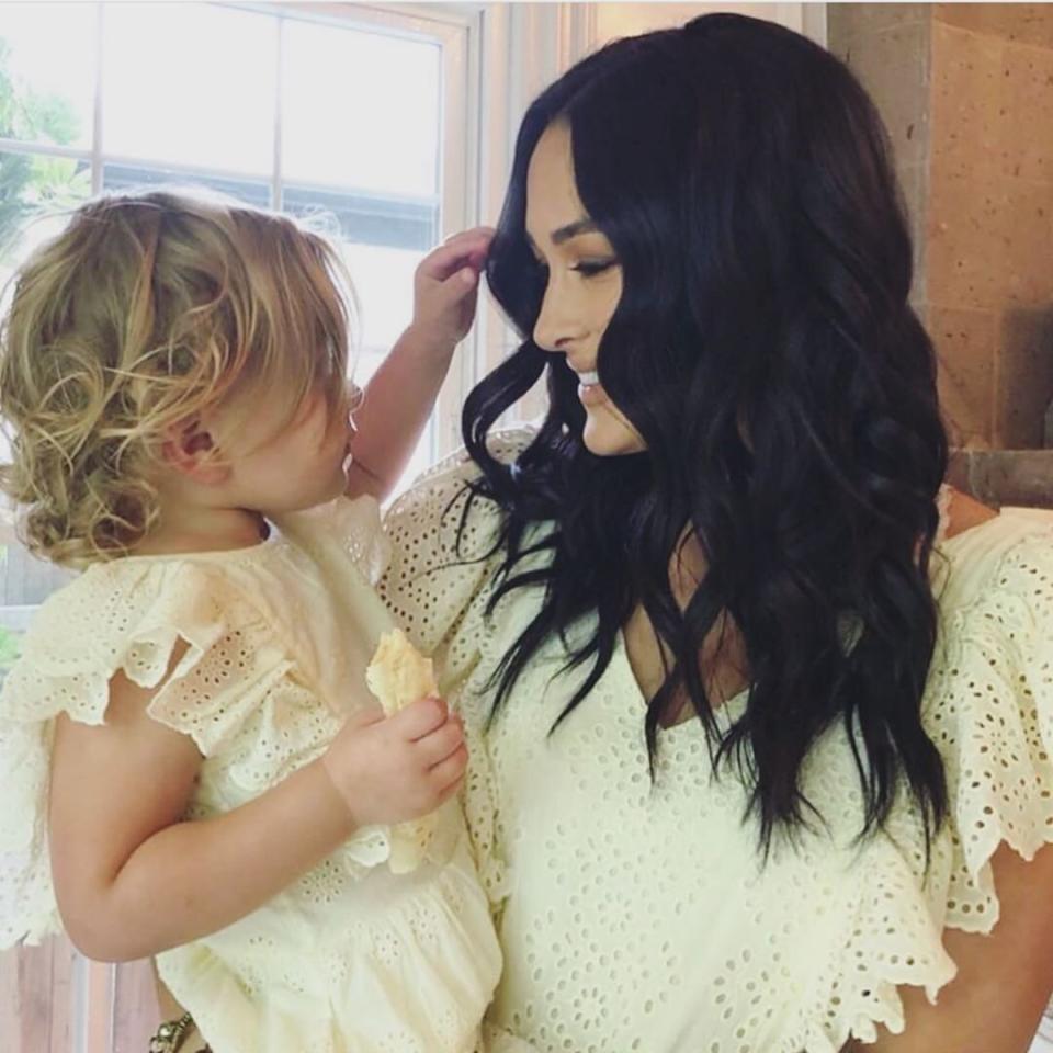 Who wore it best? (Trick question — the eyelet lace and ruffled sleeve combo is clearly a hit for both of them, duh!)