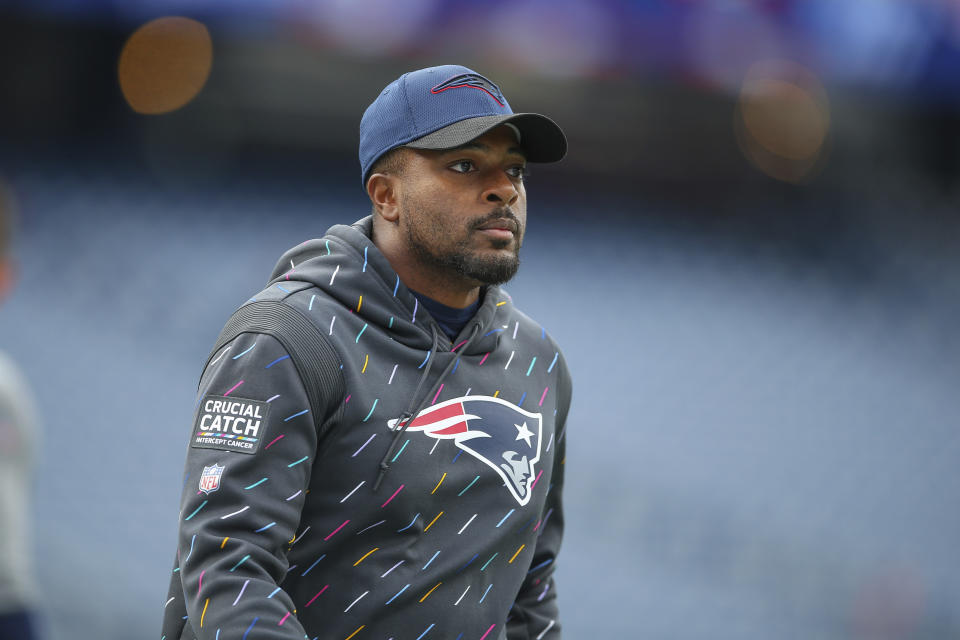 FILE - New England Patriots defensive coach Ross Douglas is shown prior to an NFL football game against the Dallas Cowboys, Sunday, Oct. 17, 2021, in Foxborough, Mass. The Patriots are one of the NFL’s most successful franchises, winning six Super Bowls. But they, like many NFL teams, have a less than impressive record when it comes to hiring minority assistant coaches. (AP Photo/Stew Milne, File)