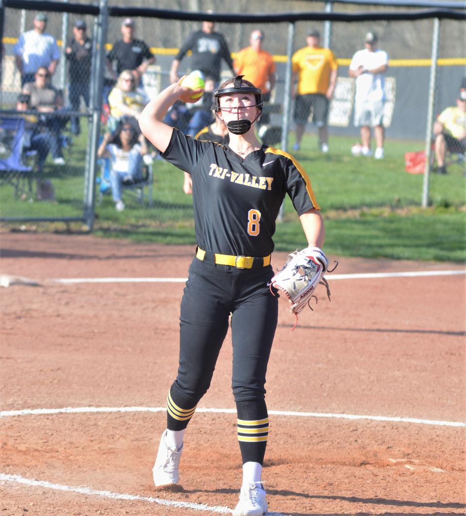 Tri-Valley pitcher Paiton Murphy throws to first base during Tuesday's game with Watkins Memorial at Kenny Wolford Park.