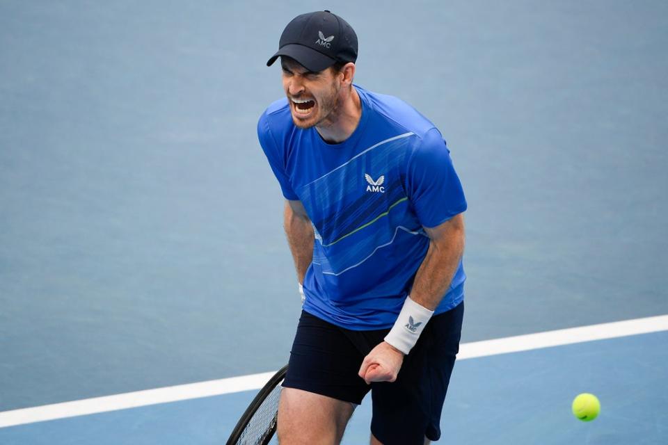 Andy Murray roars during his first-round win over Nikoloz Basilashvili (Andy Brownbill/AP)