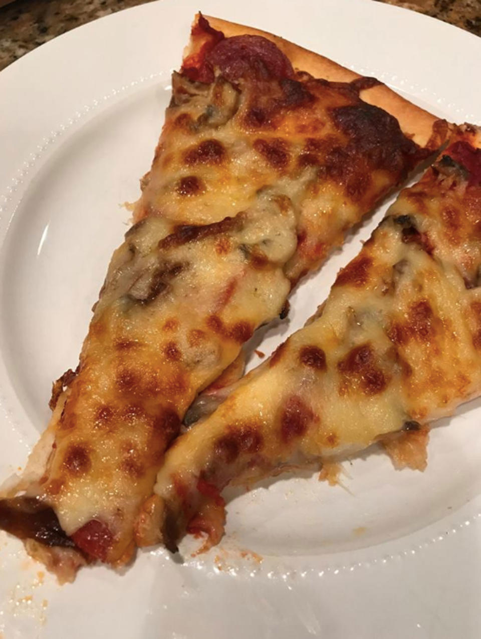 Julie Morgan shared a picture of the pizza and a heartfelt post after the touching act for her partner. Photo: Facebook