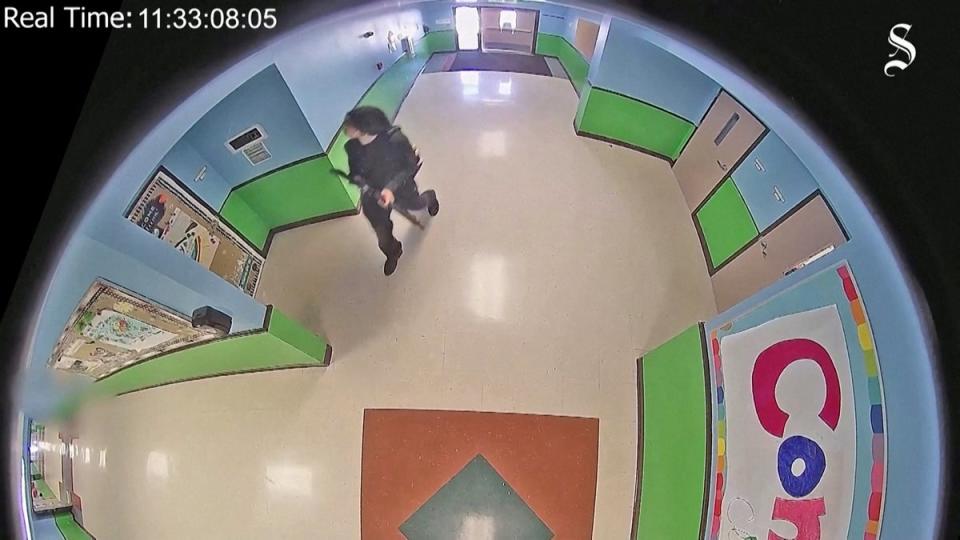 Salvador Ramos seen on surveillance footage entering Robb Elementary School on 24 May (via REUTERS)