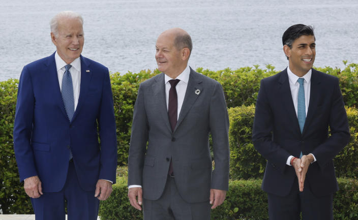 From left, U.S. President Joe Biden, Germany's Chancellor Olaf Scholz and Britain's Prime Minister Rishi Sunak participate in a family photo with G7 leaders before their working lunch meeting on economic security during the G7 summit, at the Grand Prince Hotel in Hiroshima, western Japan Saturday, May 20, 2023. (Jonathan Ernst/Pool Photo via AP)