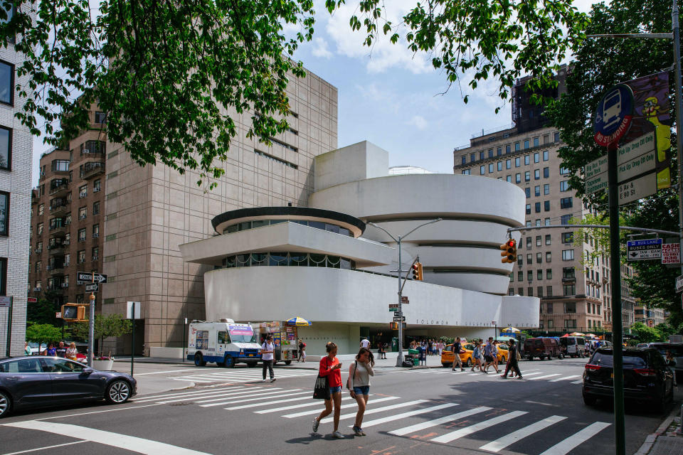 NEW YORK, NY - JULY 08: People pass the Solomon R. Guggenheim Museum on July 8, 2019 in New York City. Designed by architect Frank Lloyd Wright, UNESCO has named the building a world heritage site and is one of eight Wright properties to receive the honor. (Photo by Kevin Hagen/Getty Images)