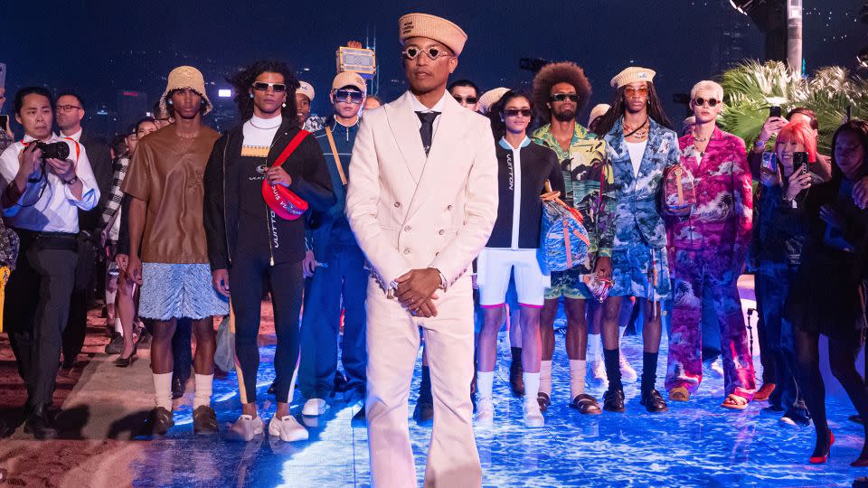 Creative director Pharrell Williams on the Avenue of Stars promenade. The event marked Louis Vuitton's first ever fashion show in Hong Kong. - Lam Yik/Bloomberg/Getty Images