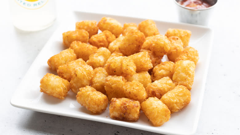 tater tots on white plate