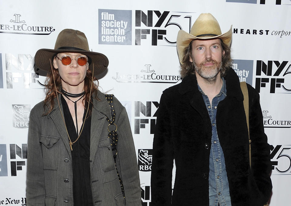 FILE - In this Sept. 28, 2013 file photo, musicians Gillian Welch and David Rawlings attend the premiere of "Inside Llewyn Davis" during the 51st New York Film Festival in New York. Welch and Rawlings were nominated for an Oscar for best original song for "When A Cowboy Trades His Spurs For Wings” from “The Ballad of Buster Scruggs." (Photo by Evan Agostini/Invision/AP, File)
