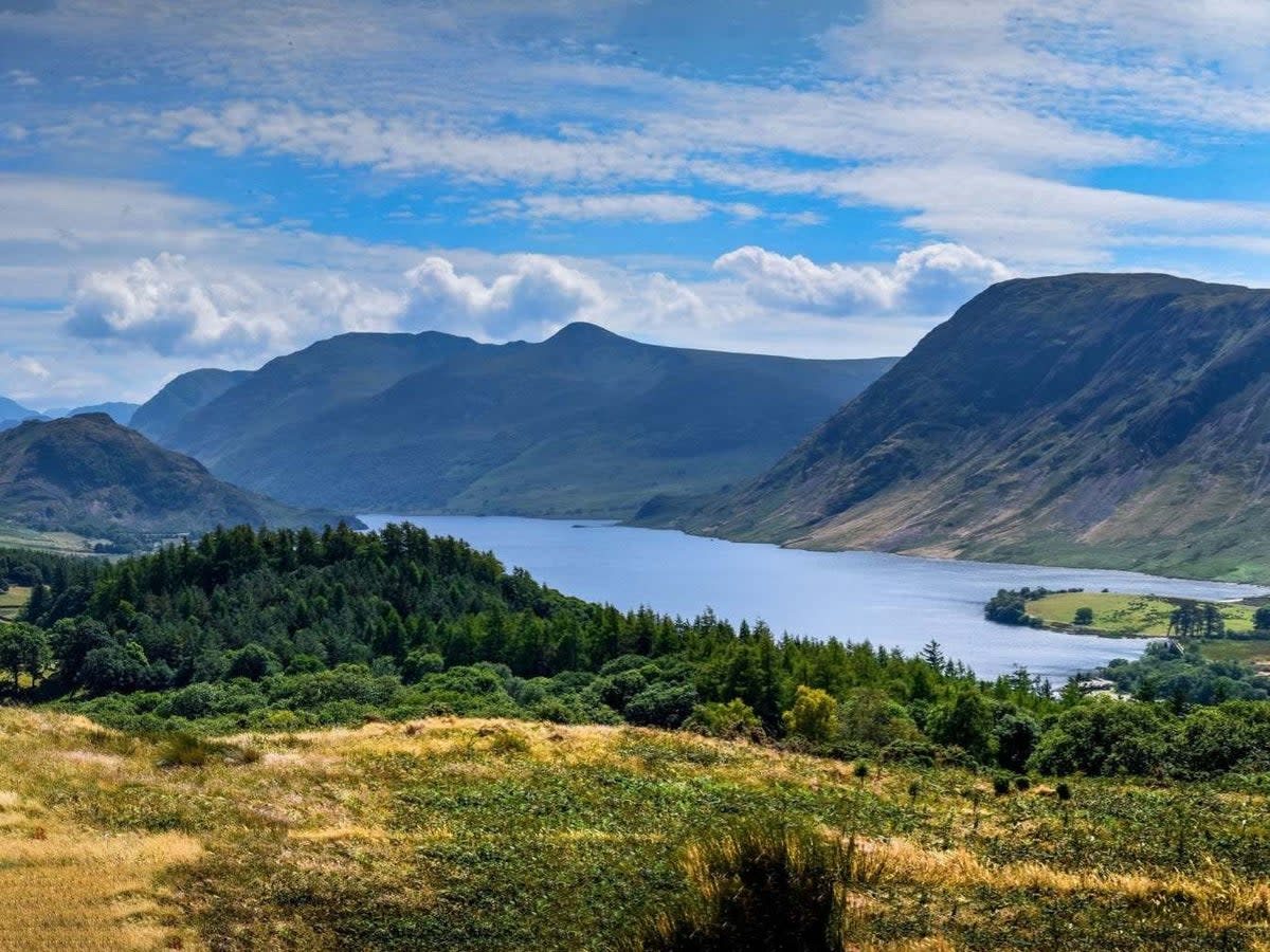 Tourists flock to the Lake District and other UK beauty spots to get selfies (PA)