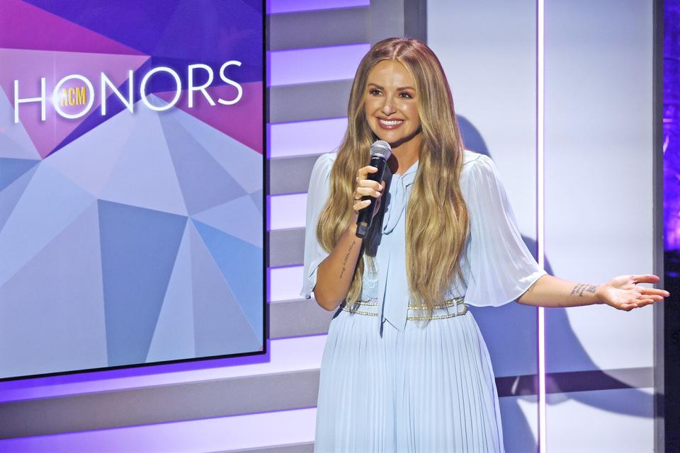 NASHVILLE, TENNESSEE - AUGUST 24: Carly Pearce speaks onstage during the 15th Annual Academy Of Country Music Honors at Ryman Auditorium on August 24, 2022 in Nashville, Tennessee. (Photo by Brett Carlsen/Getty Images for ACM)